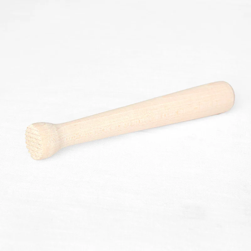 Pilon à cocktail en bois